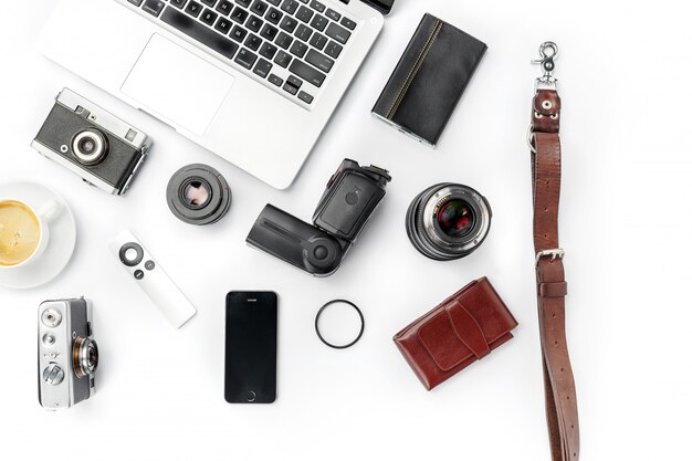 Workplace of business. Modern male accessories and laptop on white