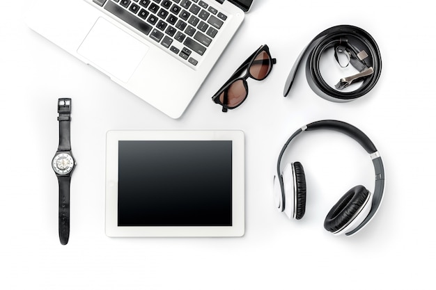 Free photo workplace of business. modern male accessories and laptop on white