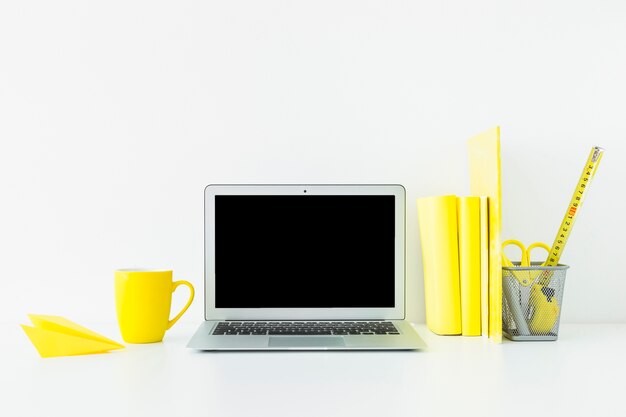 Workplace in white and yellow colors to work and study