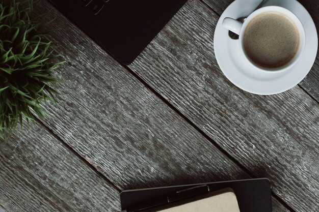 Workplace with computer and coffee cup