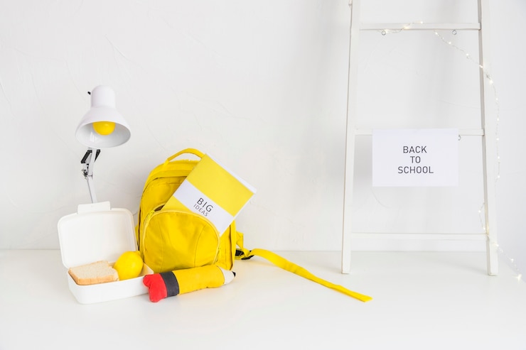 Free Photo workspace for students in white and yellow colors