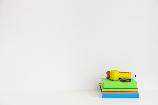 workspace with colorful notebooks