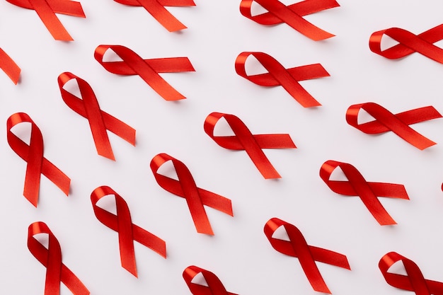 Red Support Ribbon isolated on white background. World aids day and  national HIV AIDS and aging awareness month with red ribbon. copyspace area  15106345 Stock Photo at Vecteezy