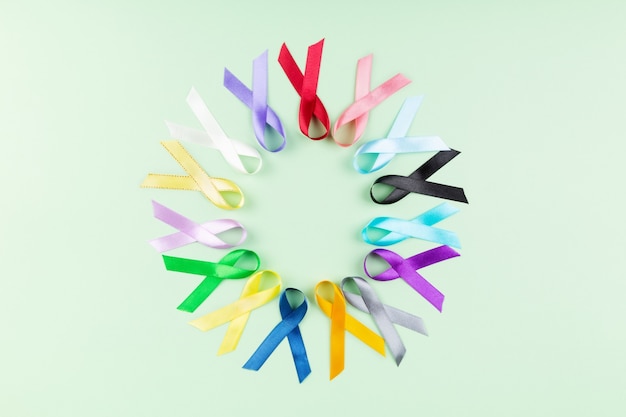 World cancer day background. colorful ribbons  cancer awareness. top view