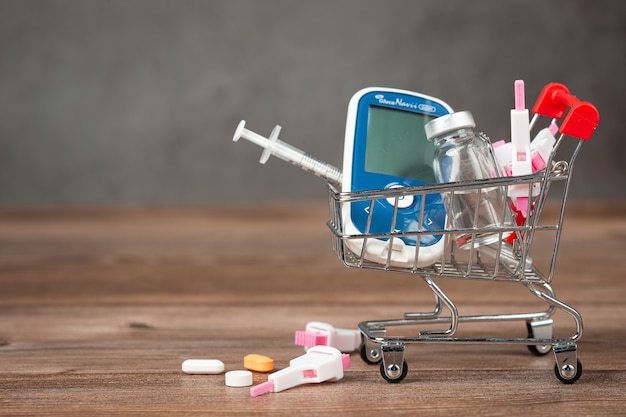 World diabetes day;Medical equipment on wooden floor