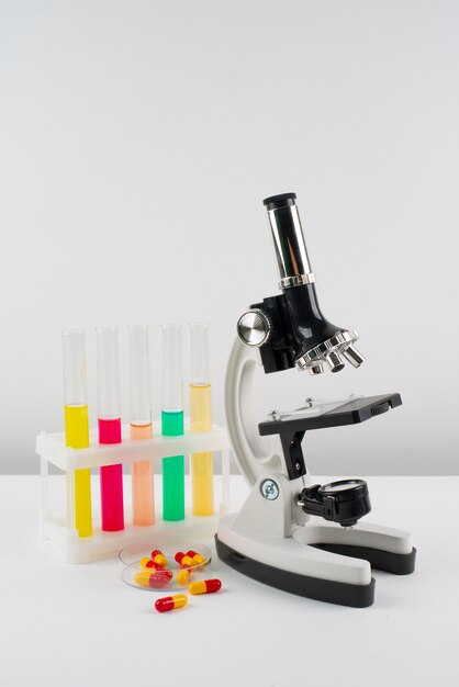 World science day arrangement with microscope and copy space