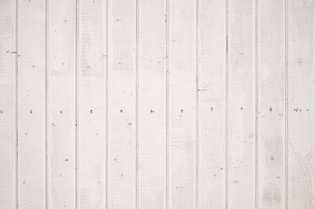 Worn dirty white vintage wood background sun faded wood planks idea for interior or wallpaper