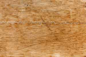 Free photo worn wood surface with scratches