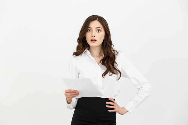 Worried businesswoman reading a notification isolated over white background