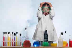 Free photo worried girl in science lab