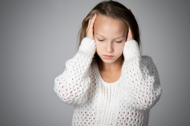 Free photo worried student with hands on head