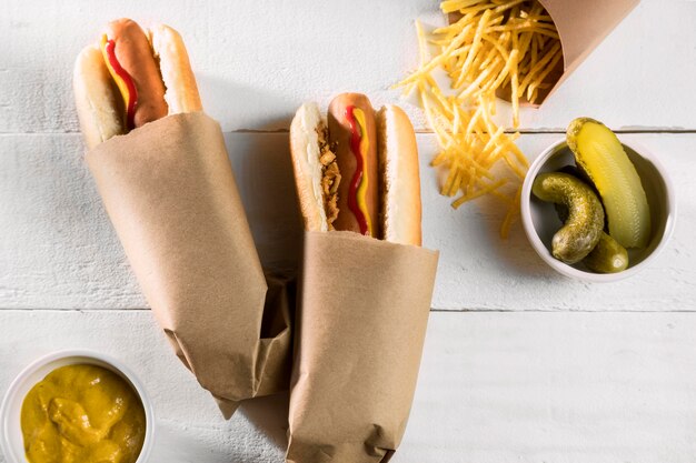 Free photo wrapped hot dogs with pickles