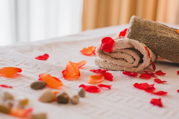 Wrapped towels and petals