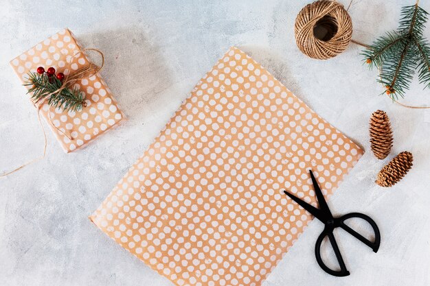 Wrapping paper with gift box on table