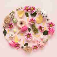 Free photo wreath of spring flowers and easter eggs