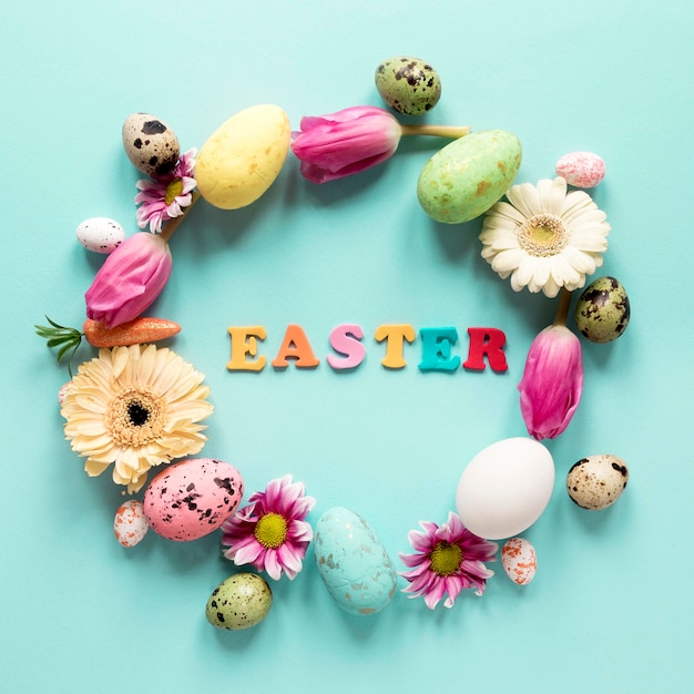 Wreath of spring flowers and easter eggs