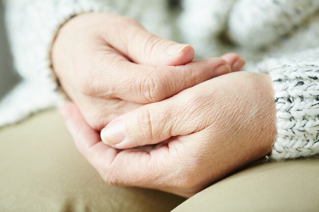 Wrinkled female hands