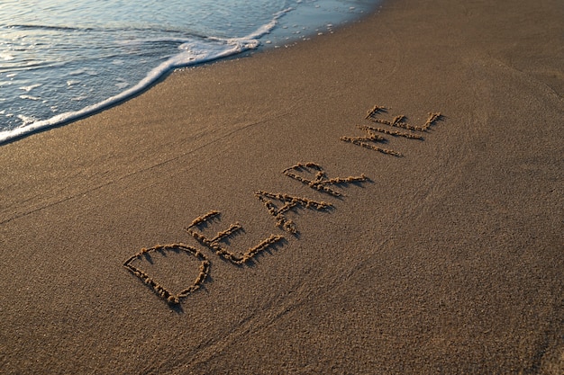 Writing words in the sand