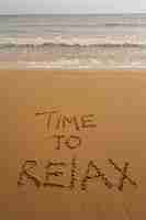 Free photo writing words in the sand