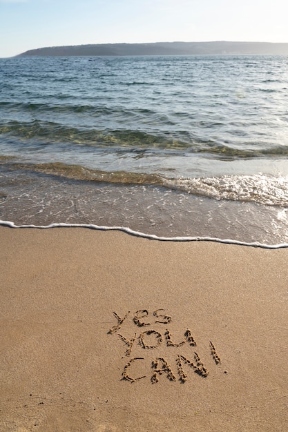 Writing words in the sand