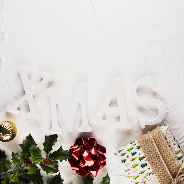 Xmas title near Christmas decorations