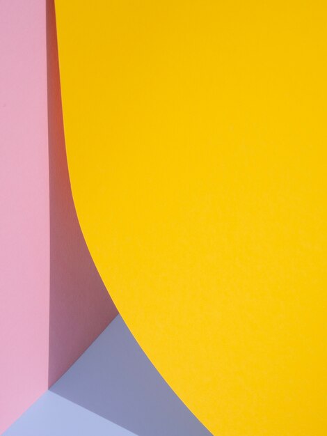 Yellow abstract paper shapes with shadow