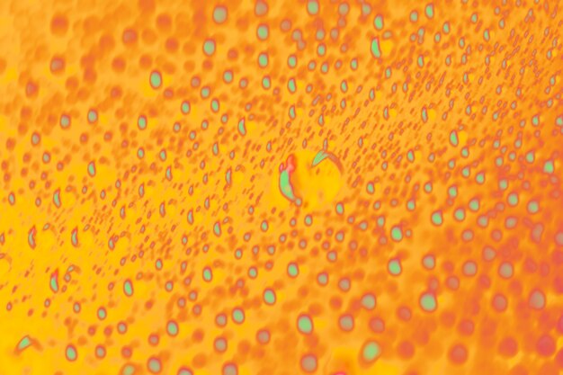 Yellow abstract seamless pattern with drops