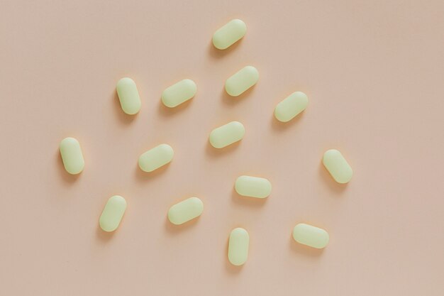 Yellow antibiotics on a beige background