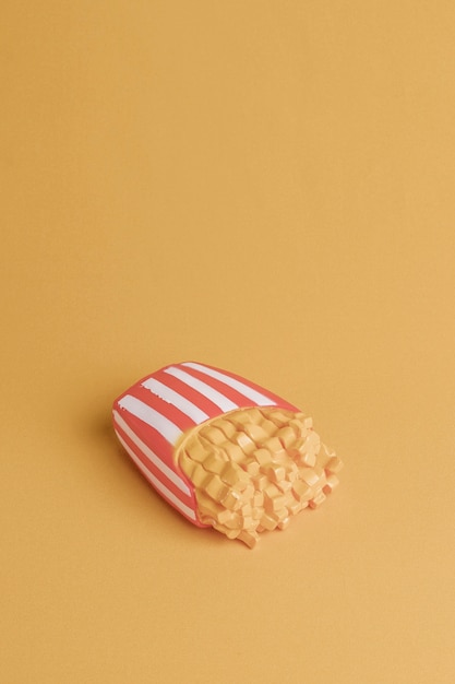 Yellow background with isometric fries