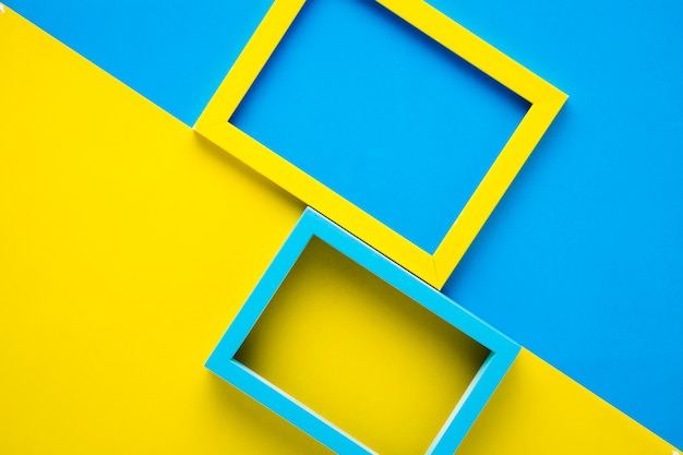 Yellow and blue frames on bicolor background