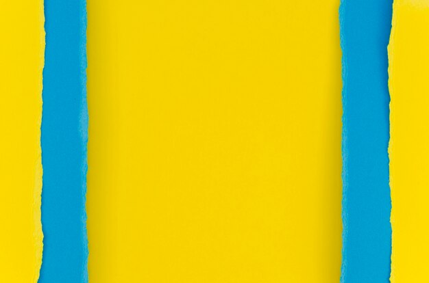 Yellow and blue torn paper