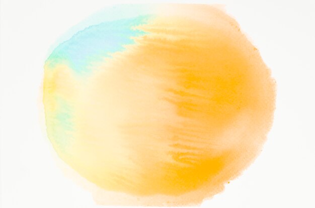 Yellow and blue watercolor texture spot isolated on white backdrop