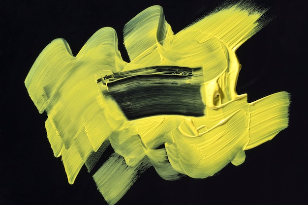 黄色のブラシストロークの抽象芸術