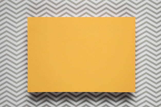 Yellow card with patterned background