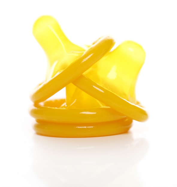 Free photo yellow condoms isolated