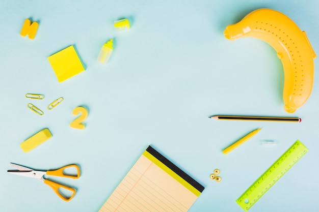 Yellow creative workplace with stationery