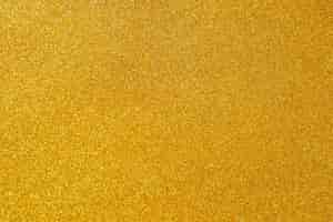 Free photo yellow glitter background background for different backgrounds concept