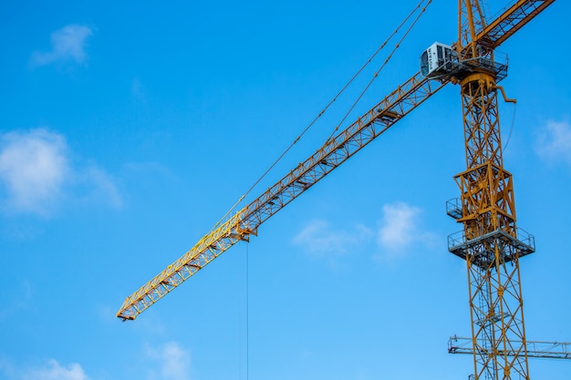 Yellow heavy crane with cabin