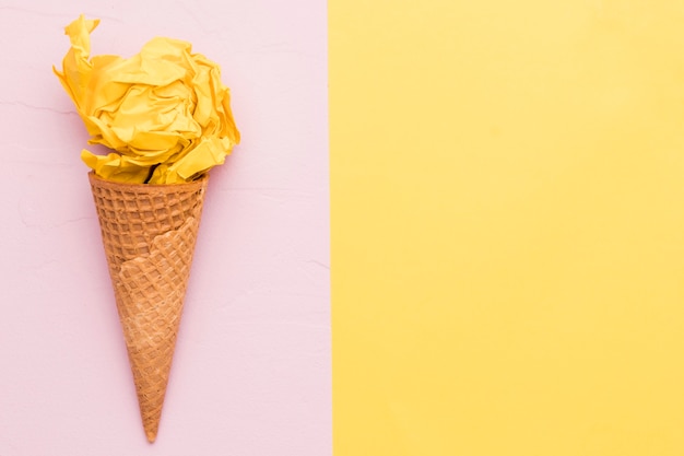 Yellow ice cream on different color background