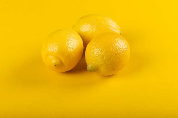 Yellow lemons isolated .