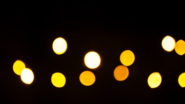 Yellow lights on black background