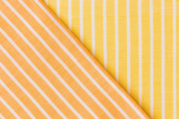 Yellow and an orange fabric clothes backdrop