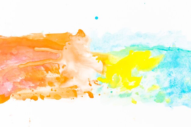 Yellow paint on orange and turquoise