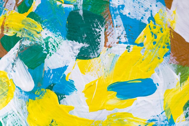 Желтая краска текстурированный фон абстрактный ручной работы экспериментальное искусство