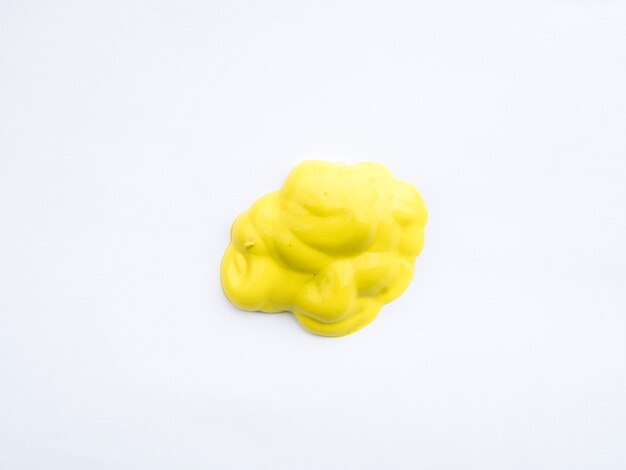 Yellow paint on white background