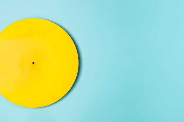 Yellow painted vinyl arrangement with copy space