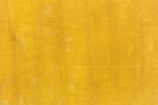 黄色の塗られた壁の背景