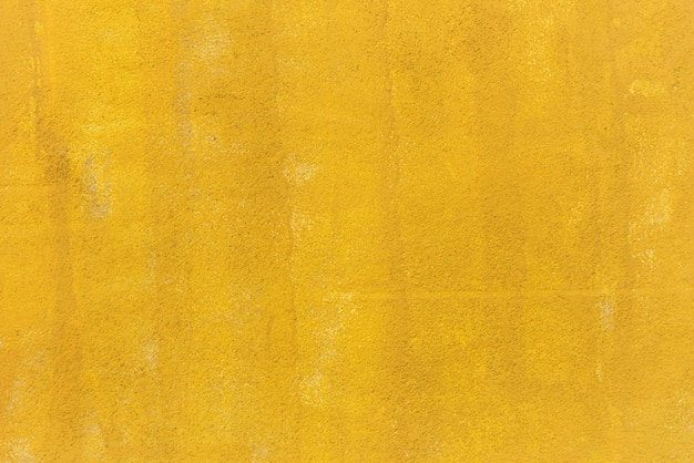 黄色の塗られた壁の背景