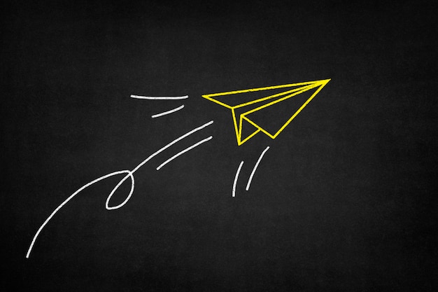 Free photo yellow paper airplane