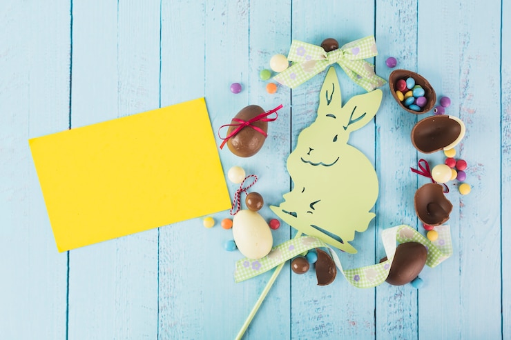 Free Photo yellow paper near easter composition